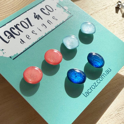 Set of colorful earrings on a Lacroz & Co. Designs card.